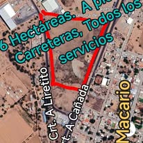 Vista panorámica de terreno y construcciones cercanas